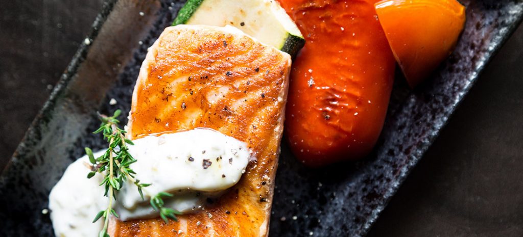 Image showing a plate of salmon with some vegetables